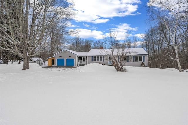 single story home with a garage