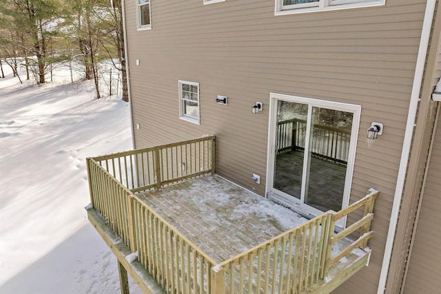 view of snow covered deck