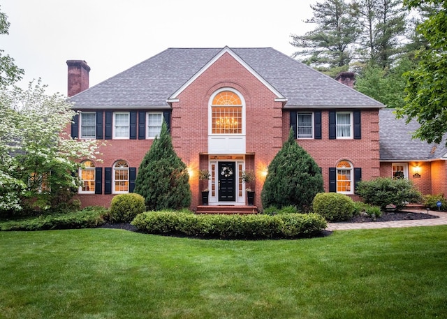 colonial house with a front lawn