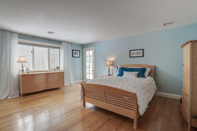 bedroom featuring light wood-type flooring