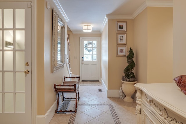 doorway to outside featuring light tile patterned floors and ornamental molding