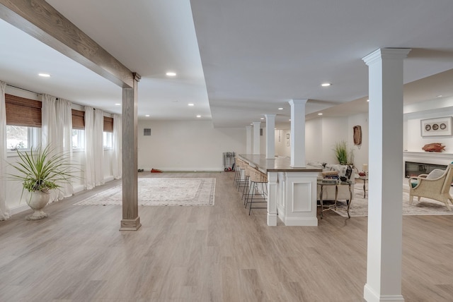 basement featuring light wood-type flooring