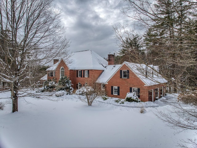 view of snow covered property