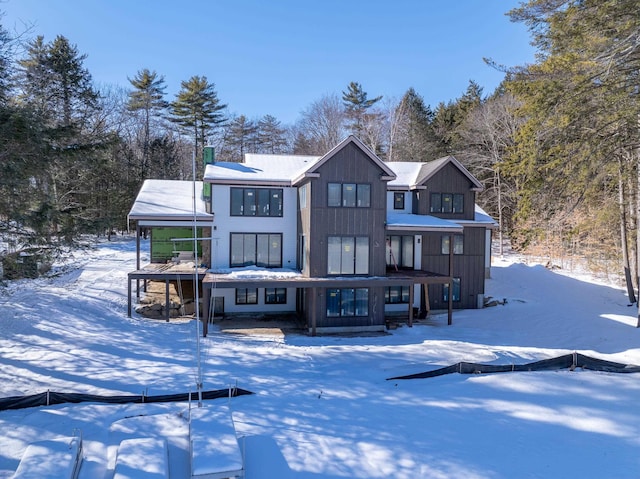 view of snow covered house