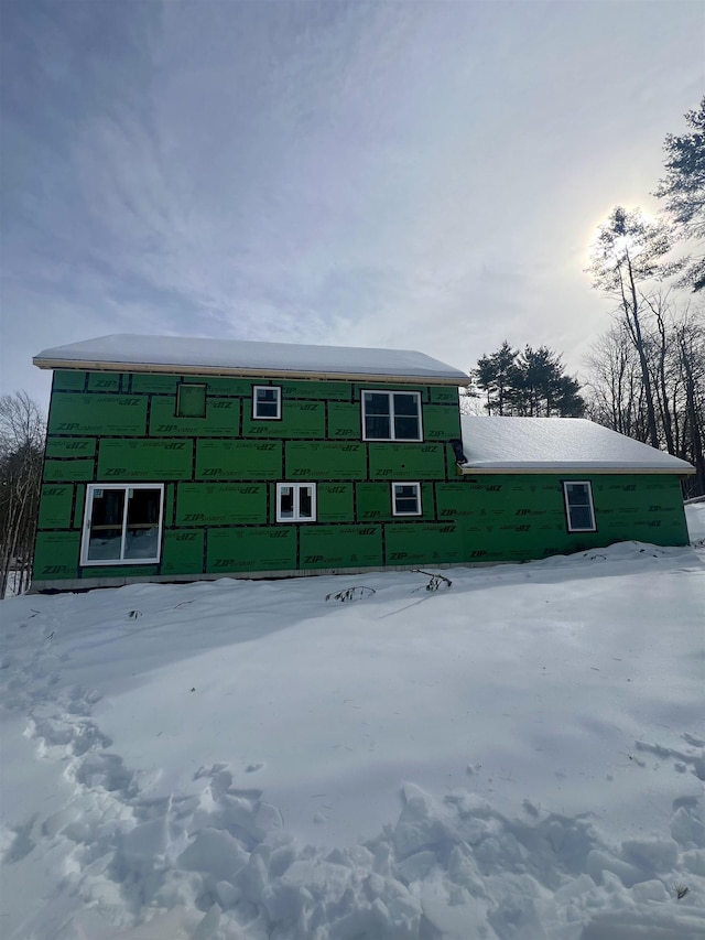 view of snow covered property