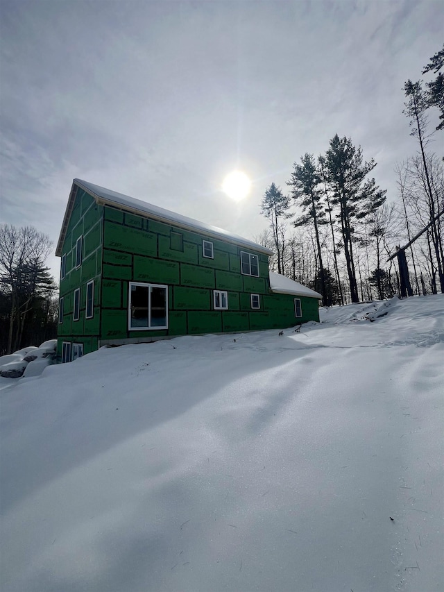 view of snow covered property