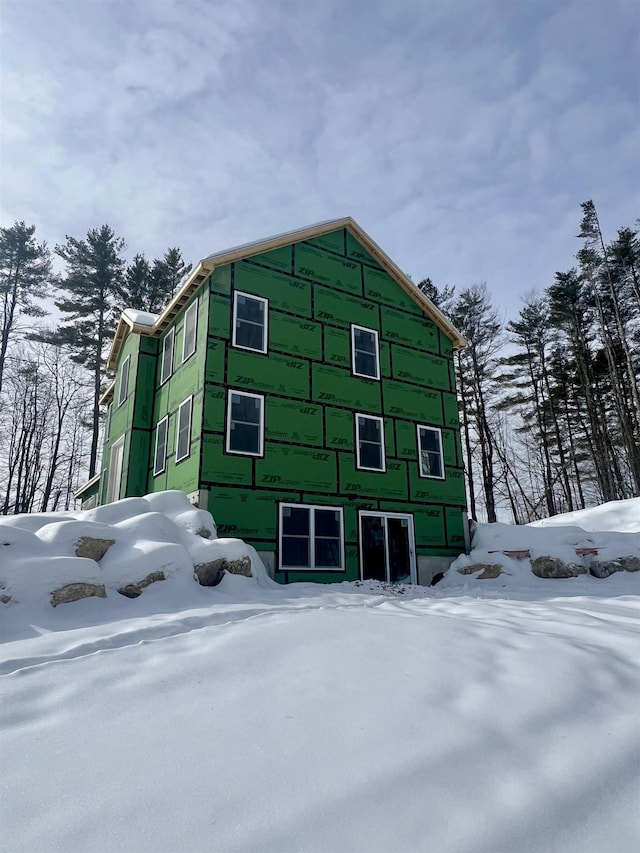 view of snow covered property