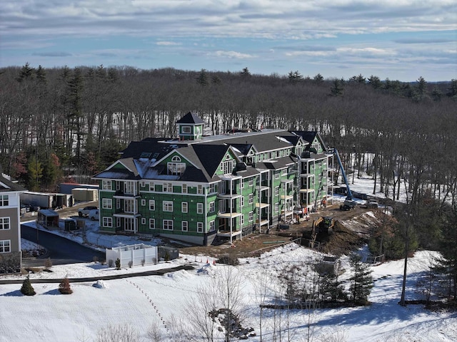 view of snow covered property