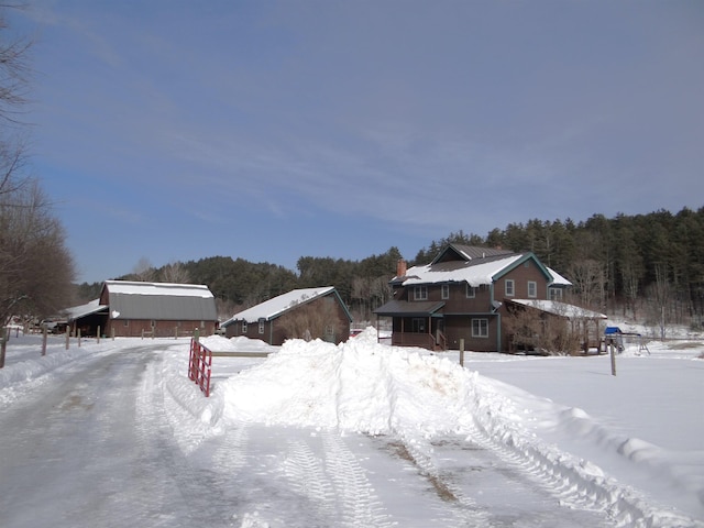 view of yard covered in snow