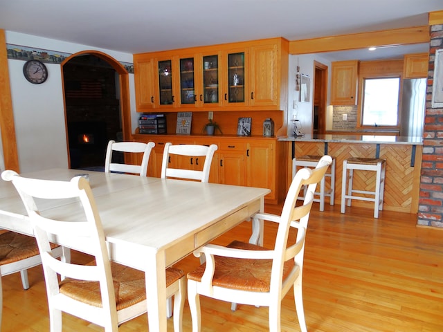 dining area with light hardwood / wood-style flooring