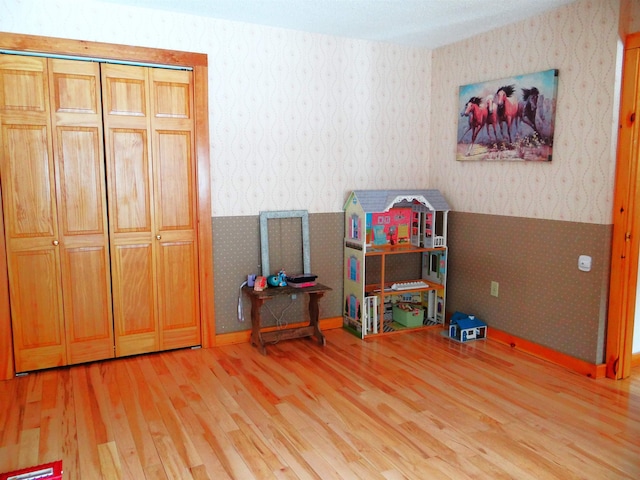 rec room featuring hardwood / wood-style floors