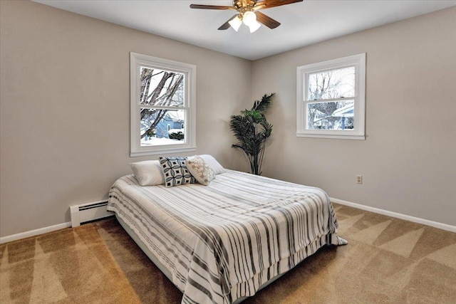 bedroom featuring a baseboard radiator, carpet, and ceiling fan