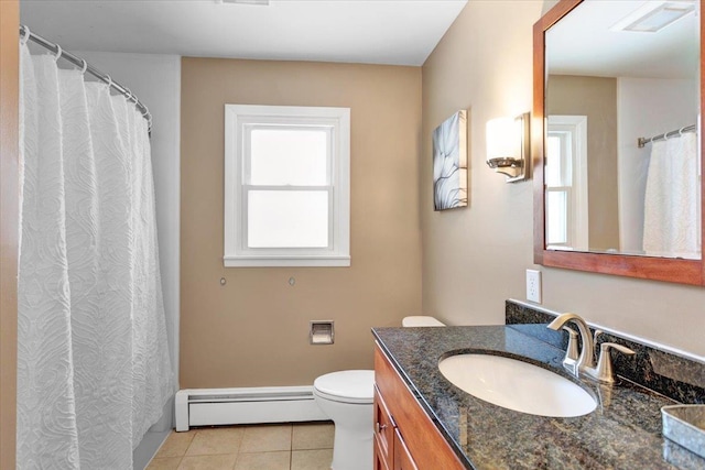 bathroom featuring tile patterned floors, vanity, toilet, and a baseboard heating unit