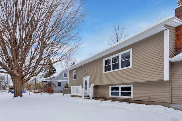 view of snow covered property