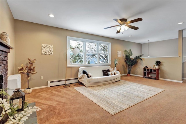 living room featuring ceiling fan, a baseboard radiator, and carpet floors