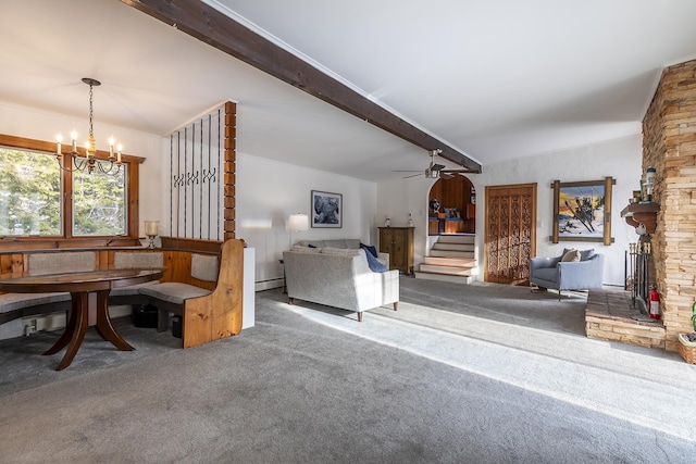 carpeted living room with baseboard heating, a fireplace, ceiling fan with notable chandelier, and lofted ceiling with beams