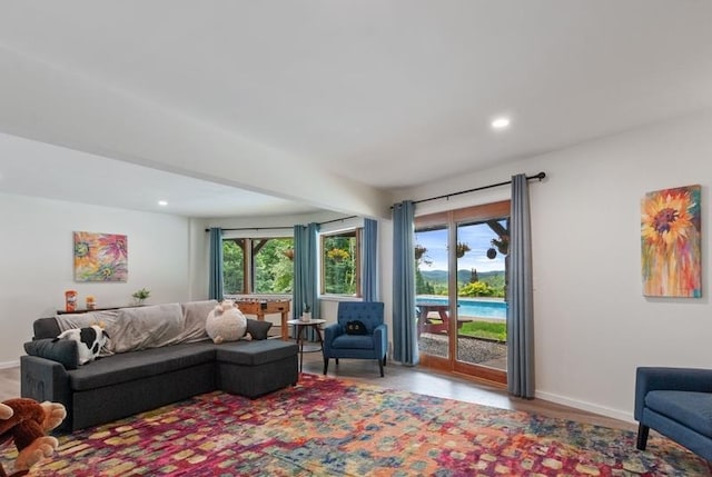 living room featuring a wealth of natural light