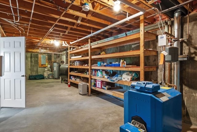 storage room with electric panel and water heater