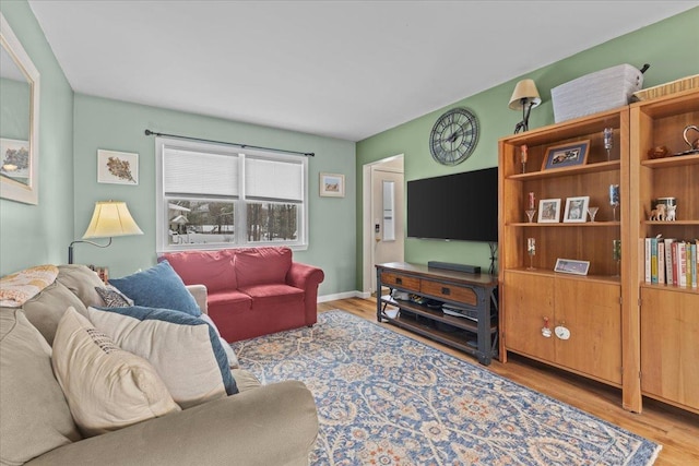 living room with light hardwood / wood-style floors