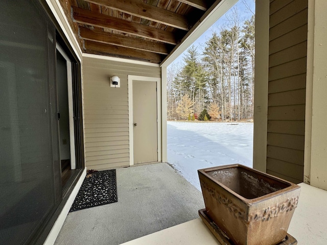 view of snow covered patio