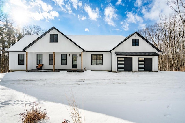 modern farmhouse featuring a garage