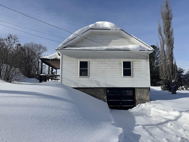 view of snow covered property