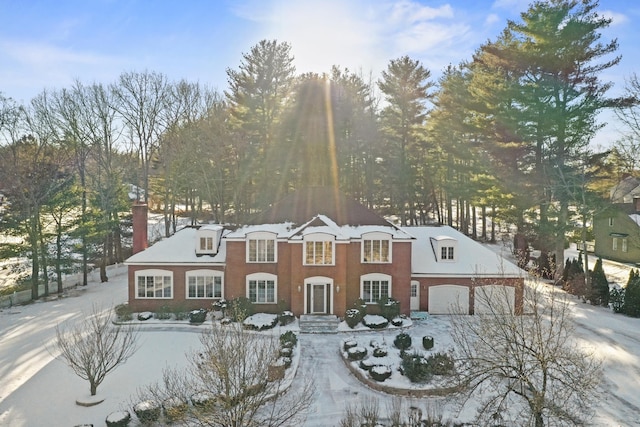 view of front of property with a garage