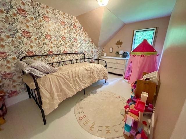 bedroom featuring vaulted ceiling