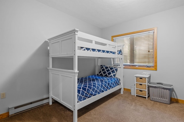 bedroom featuring carpet floors and a baseboard heating unit