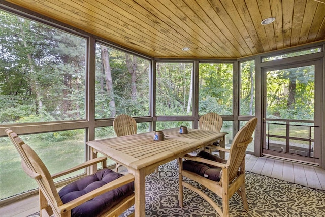 sunroom / solarium featuring wood ceiling