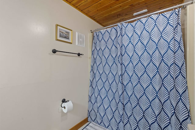 bathroom featuring wooden ceiling