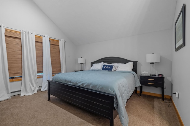 bedroom featuring vaulted ceiling and carpet flooring