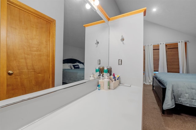 bathroom with vaulted ceiling