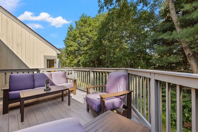 wooden deck featuring outdoor lounge area