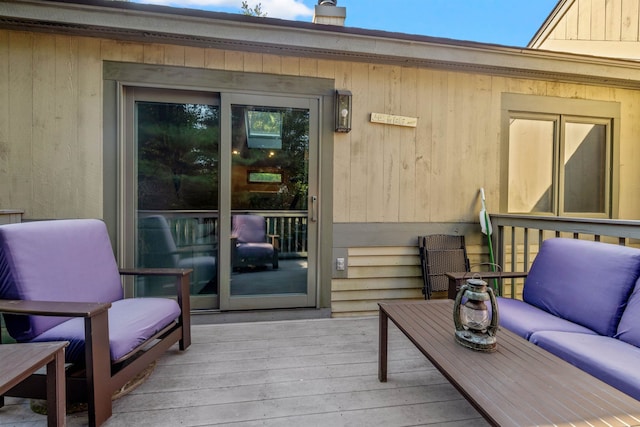 deck with an outdoor hangout area