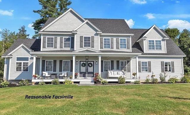 view of front of property with a porch and a front lawn