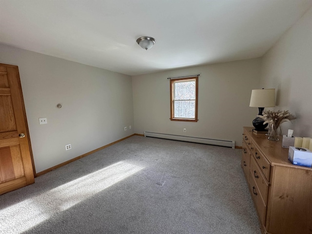 unfurnished bedroom featuring light colored carpet and baseboard heating