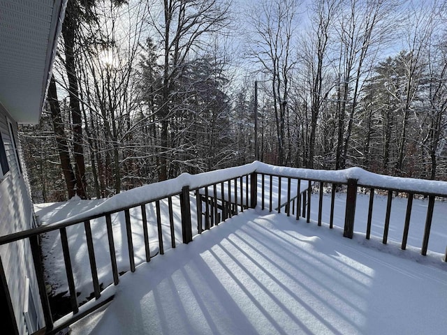 view of snow covered deck