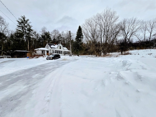 view of yard covered in snow