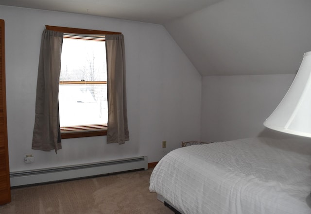 carpeted bedroom featuring lofted ceiling and a baseboard heating unit