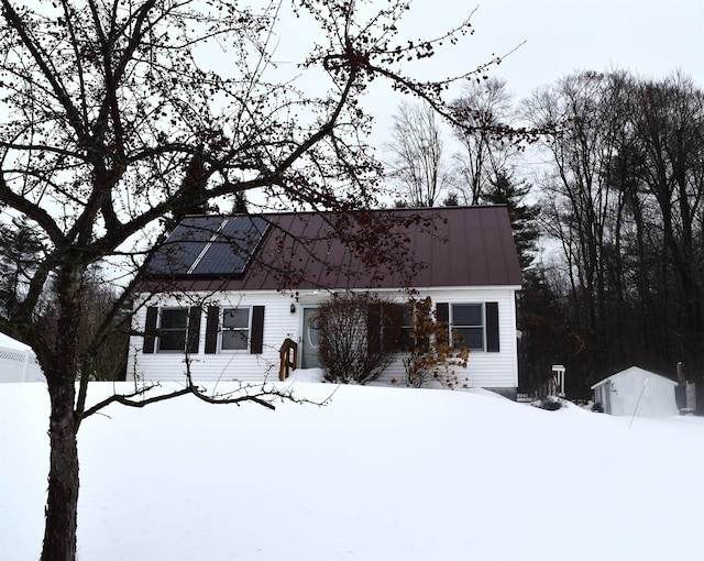 view of front of home with solar panels