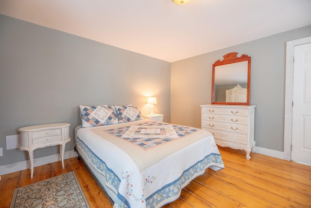 bedroom featuring hardwood / wood-style floors