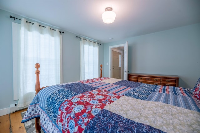 bedroom featuring wood-type flooring