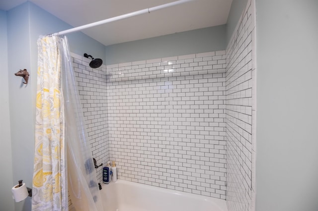 bathroom with shower / bath combo