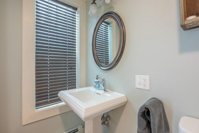 bathroom featuring sink and toilet