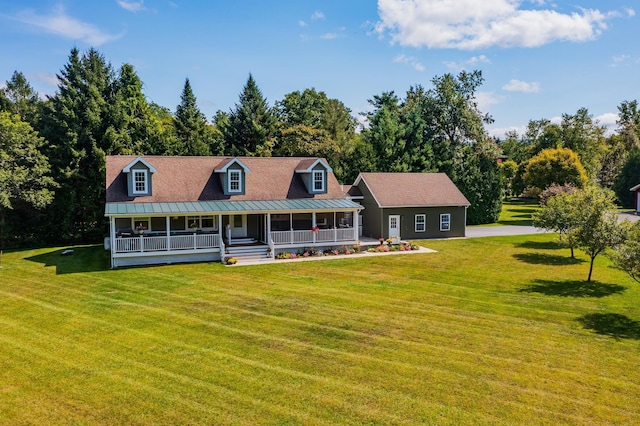 view of front of house featuring a front yard and a porch