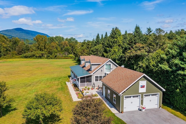 birds eye view of property featuring a mountain view