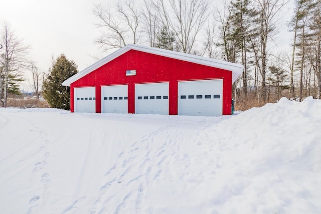 view of snow covered garage