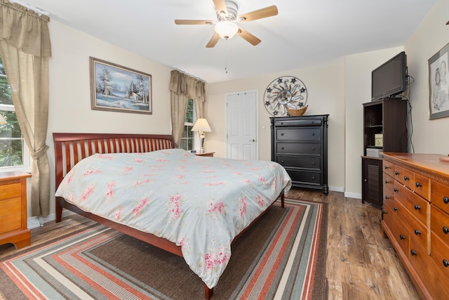 bedroom featuring hardwood / wood-style floors and ceiling fan