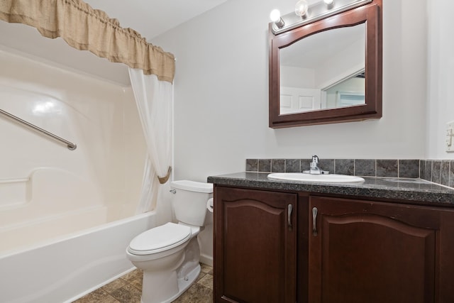 full bathroom featuring vanity, shower / bath combination with curtain, and toilet